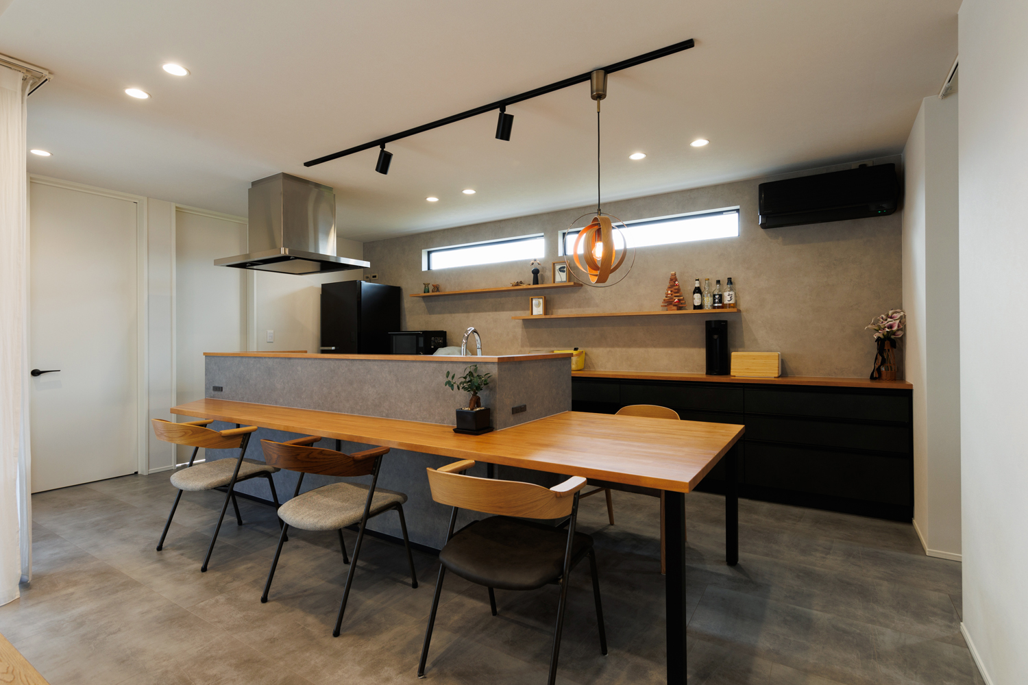 Photo of a track lighting that we used for inspiration (our layout is different so we got two separate rails for the counter and the table)